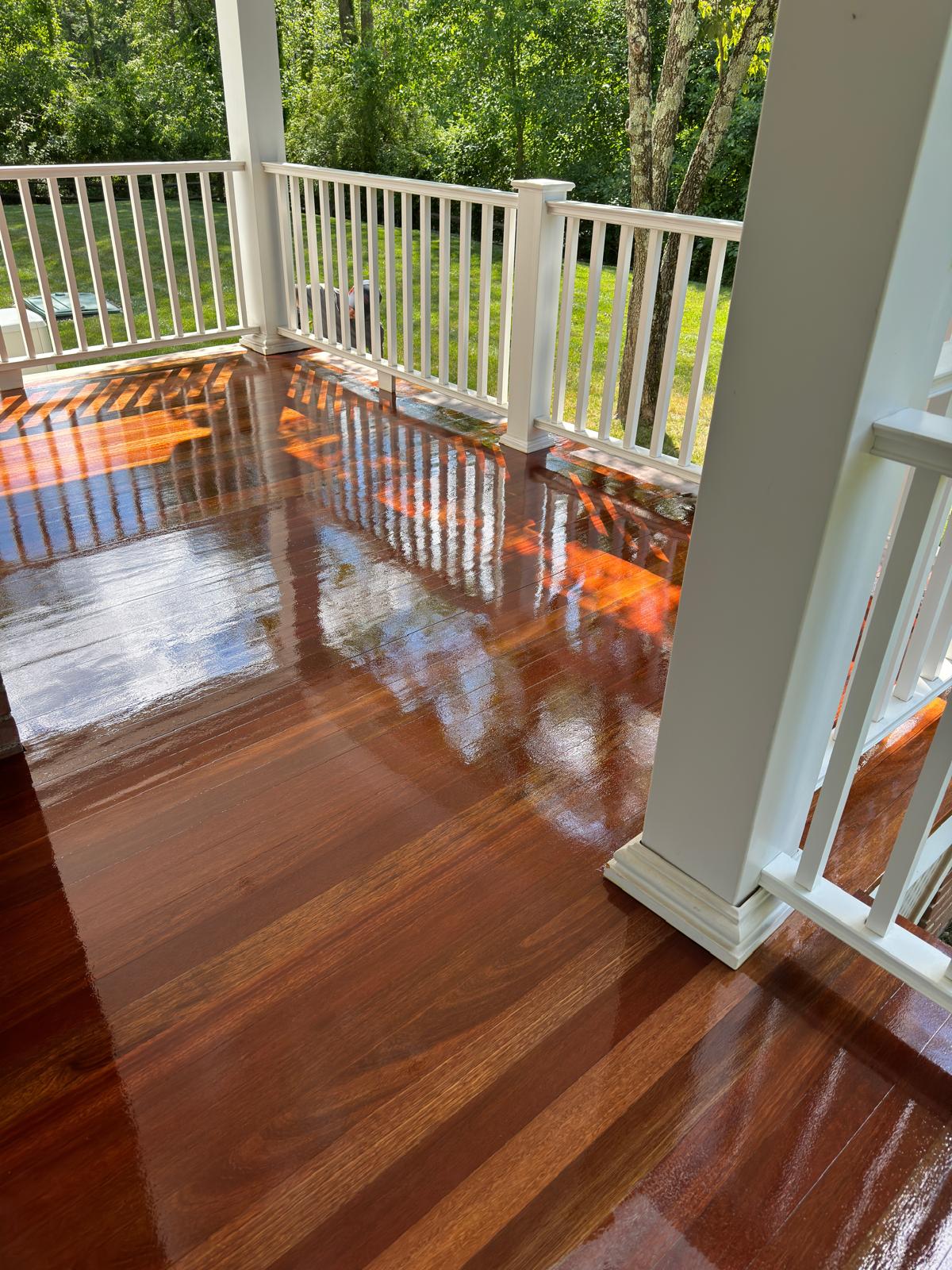 Refinished mahogany-toned exterior deck flooring